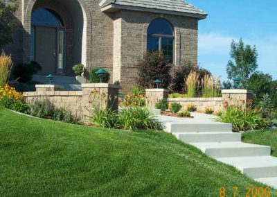 Front yard landscaping by Greenside Inc in Savage, MN.