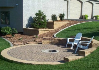 Residential Patio and fire pit construction by Greenside Inc in Savage, MN.