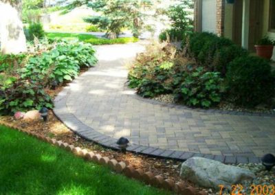 Brick walkway landscaping by Greenside Inc in Savage, MN.
