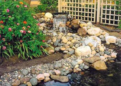 Waterfall landscaping by by Greenside Inc in Savage, MN.